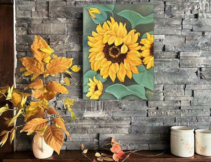 Sunflower painting on fireplace