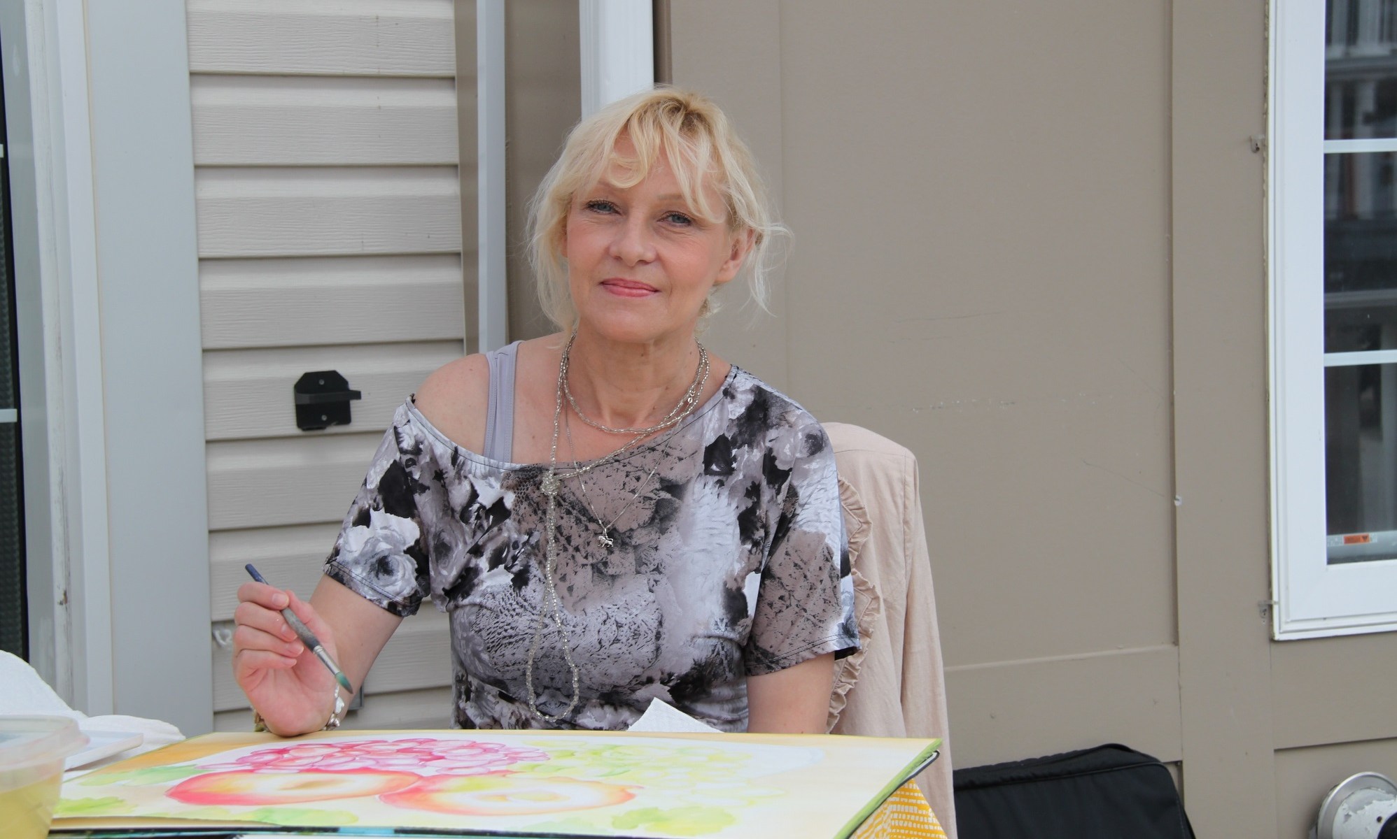 Artist Inese Poga, painting demonstration